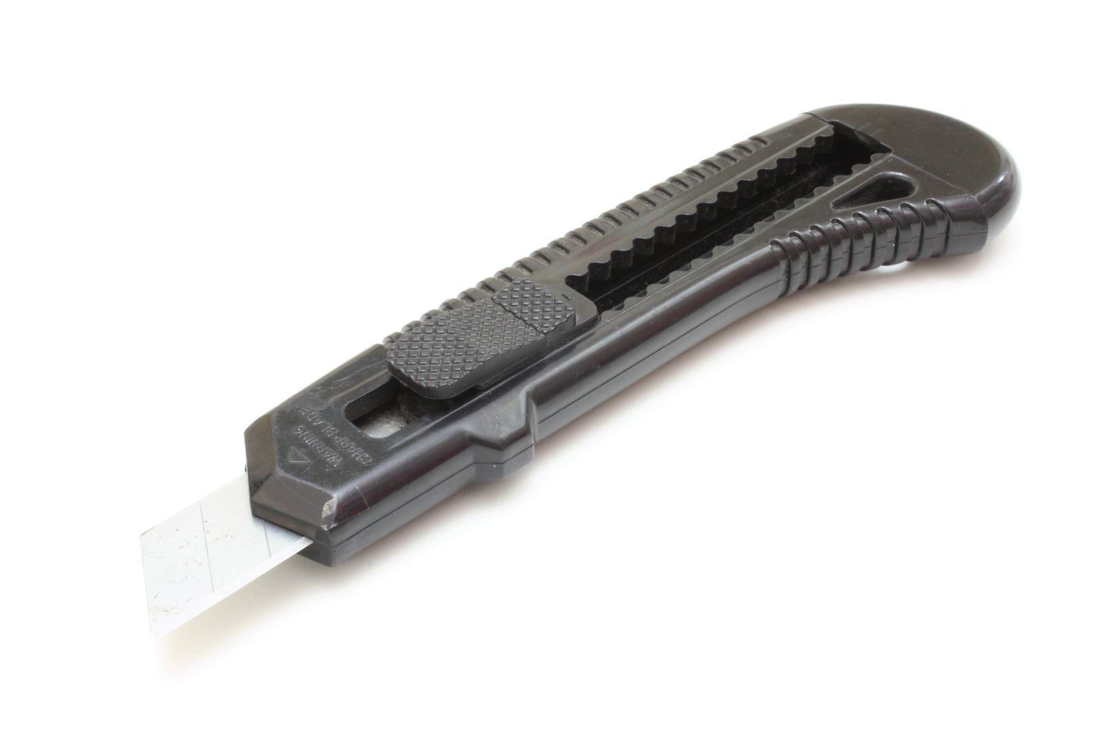 Black snap-off utility cutter with its sharp blade extended, on a white background